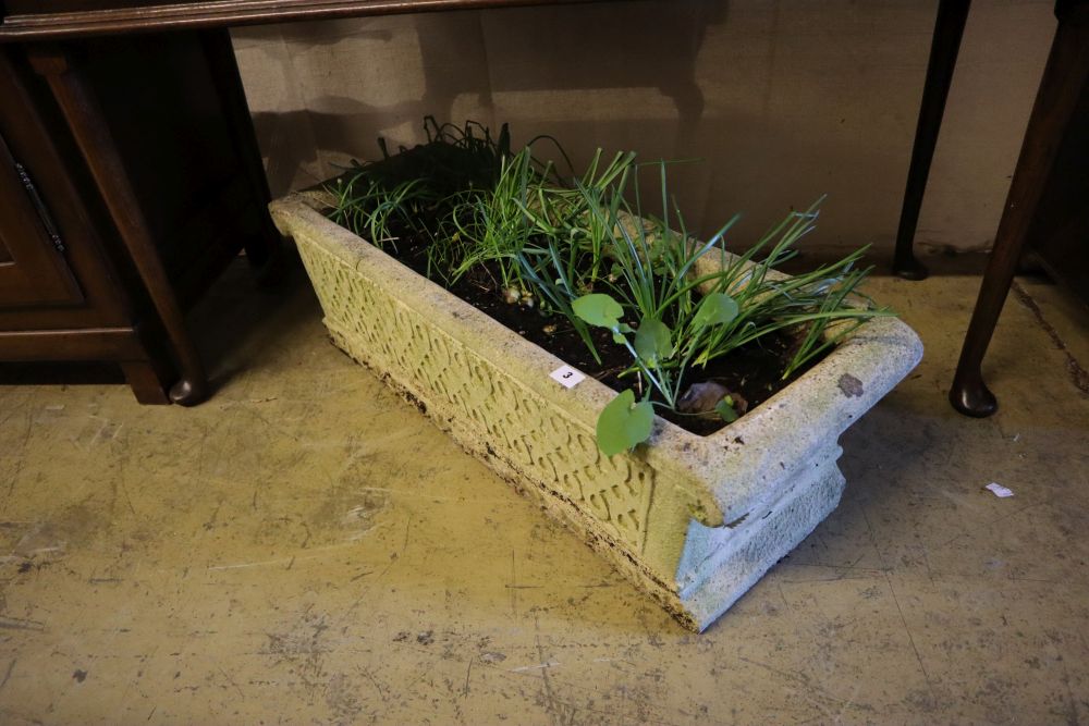 A rectangular reconstituted stone garden planter, width 90cm, depth 33cm height 27cm
